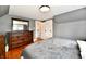 Bedroom boasts a large dresser and great closet access at 209 E John St, Alexandria, IN 46001