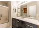 Modern bathroom featuring a dark vanity, white countertop, and glass-enclosed shower at 2096 Whitetail Ct, Avon, IN 46123