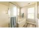 Bright bathroom with soaking tub, shower, and wood look flooring at 2096 Whitetail Ct, Avon, IN 46123