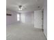 Spacious bedroom with light purple walls, white trim, and plush gray carpeting at 2096 Whitetail Ct, Avon, IN 46123