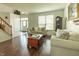 Inviting living room with hardwood floors, comfortable seating, and natural light at 2096 Whitetail Ct, Avon, IN 46123