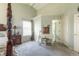 Spacious main bedroom featuring a vaulted ceiling, sitting area, and ensuite bath at 2096 Whitetail Ct, Avon, IN 46123