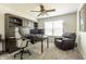 Office with built-in shelving, desk, and neutral decor at 2096 Whitetail Ct, Avon, IN 46123