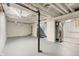 Unfinished basement featuring painted floors and ceiling at 2164 E Raymond St, Indianapolis, IN 46203