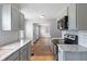 Charming kitchen with granite counters and stainless steel appliances at 2164 E Raymond St, Indianapolis, IN 46203