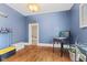 Bonus room offers pinball machine, hardwood floors, and ample storage at 245 S Washington St, Danville, IN 46122