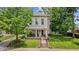 Inviting two-story home with a cozy front porch and well-manicured lawn at 245 S Washington St, Danville, IN 46122