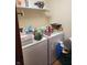 Functional laundry room features washer and dryer for convenient chores at 247 Meridian Ct, Pittsboro, IN 46167