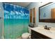 Stylish bathroom with a blue, ocean-themed shower curtain and modern vanity at 2782 Branigin Creek Blvd, Franklin, IN 46131