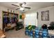 Bedroom features a closet, ceiling fan, plush carpet, and neutral wall color at 2782 Branigin Creek Blvd, Franklin, IN 46131