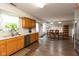 Open kitchen featuring a stainless steel refrigerator and a dining area with a table at 2782 Branigin Creek Blvd, Franklin, IN 46131