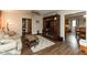 Inviting living room with wood flooring, ample seating, and an entertainment center at 2782 Branigin Creek Blvd, Franklin, IN 46131