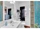 Classic bathroom design with black accents, featuring updated fixtures and a bright atmosphere for a refreshing experience at 31 S Hinman St, Columbus, IN 47201