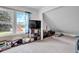Light-filled bedroom with ample storage, and serene views, providing a peaceful and organized retreat at 31 S Hinman St, Columbus, IN 47201