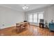 Bright dining room with hardwood floors, a classic chandelier, and traditional furniture at 31 S Hinman St, Columbus, IN 47201