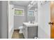 Bathroom featuring tile floors, a new vanity, and a shower-tub combo with a window at 3201 Chamberlin Dr, Indianapolis, IN 46227