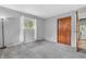 Cozy bedroom with a window, ample closet space, and freshly installed carpet at 3201 Chamberlin Dr, Indianapolis, IN 46227