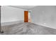 Modern bedroom with neutral walls, new carpet, and an open doorway to the house at 3201 Chamberlin Dr, Indianapolis, IN 46227
