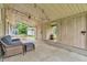Cozy covered patio with comfortable seating and ample storage space, perfect for outdoor relaxation at 3201 Chamberlin Dr, Indianapolis, IN 46227