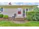 Inviting front entrance with a small porch and well-maintained landscaping at 3201 Chamberlin Dr, Indianapolis, IN 46227