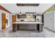 Modern kitchen featuring large island, stainless steel appliances, and stylish lighting at 3201 Chamberlin Dr, Indianapolis, IN 46227