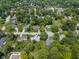 Aerial view of a charming neighborhood, showcasing the lush greenery and location on E 136th Street at 321 4Th E Ct, Carmel, IN 46033