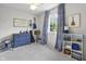 Cozy bedroom featuring a bright window, stylish curtains, and charming decor at 321 4Th E Ct, Carmel, IN 46033