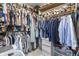 Spacious walk-in closet with ample shelving and hanging space for clothing and accessories at 321 4Th E Ct, Carmel, IN 46033