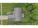 Aerial view showcasing the home's roof, surrounding greenery, and expansive backyard at 34 Westview Pl, Bargersville, IN 46106