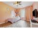 Charming bedroom with hardwood floors, a bright window, and a TV at 34 Westview Pl, Bargersville, IN 46106