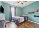 Cozy bedroom with modern decor, wood floors, and a ceiling fan for added comfort at 34 Westview Pl, Bargersville, IN 46106