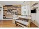 Cozy dining area with wooden accent wall and built-in seating at 34 Westview Pl, Bargersville, IN 46106