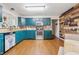 Bright kitchen featuring colorful cabinets and modern appliances at 34 Westview Pl, Bargersville, IN 46106