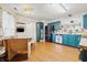 Stylish kitchen with colorful cabinetry, stainless steel appliances, and a breakfast nook at 34 Westview Pl, Bargersville, IN 46106