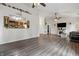 Spacious living room with wood floors, natural light, and an open design to other spaces at 34 Westview Pl, Bargersville, IN 46106