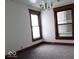 Neutral bedroom with carpet and ample natural light from two windows at 340 W 11Th St, Anderson, IN 46016