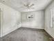 Empty bedroom with ceiling fan and natural light at 3526 E Vermont St, Indianapolis, IN 46201