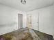 Bedroom with white walls, ceiling light and interior doors at 3526 E Vermont St, Indianapolis, IN 46201
