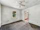 Unfurnished bedroom featuring standard ceiling fan at 3526 E Vermont St, Indianapolis, IN 46201