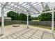 Open backyard featuring a patio with a stylish pergola and a fire pit, perfect for outdoor living at 4650 Blue Marlin Way, Indianapolis, IN 46239