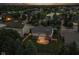Aerial view of the backyard with a fenced yard, patio, pergola, and fire pit at 4650 Blue Marlin Way, Indianapolis, IN 46239