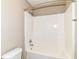 Bathroom featuring a white bathtub with a chrome shower head and fixtures at 4650 Blue Marlin Way, Indianapolis, IN 46239