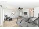 Spacious bedroom with neutral decor, a ceiling fan, and ample furniture, offering a comfortable and relaxing atmosphere at 4650 Blue Marlin Way, Indianapolis, IN 46239