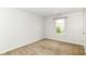 Bedroom featuring neutral carpeting and natural light from the window at 4650 Blue Marlin Way, Indianapolis, IN 46239