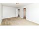 Clean bedroom with neutral carpet and a closet at 4650 Blue Marlin Way, Indianapolis, IN 46239