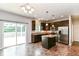 Beautiful kitchen featuring dark wood cabinets, stainless steel appliances, and a central island, perfect for cooking and entertaining at 4650 Blue Marlin Way, Indianapolis, IN 46239