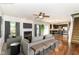 Stylish living room featuring a fireplace, modern decor, and an open layout that connects to the kitchen at 4650 Blue Marlin Way, Indianapolis, IN 46239