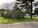 View of the home with vinyl siding, metal roof and a fenced backyard at 501 W Taylor St, Alexandria, IN 46001