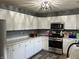 Updated kitchen featuring new appliances, countertops, cabinets, and modern finishes at 501 W Taylor St, Alexandria, IN 46001
