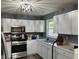 Updated kitchen featuring new appliances, countertops, cabinets, and modern finishes at 501 W Taylor St, Alexandria, IN 46001